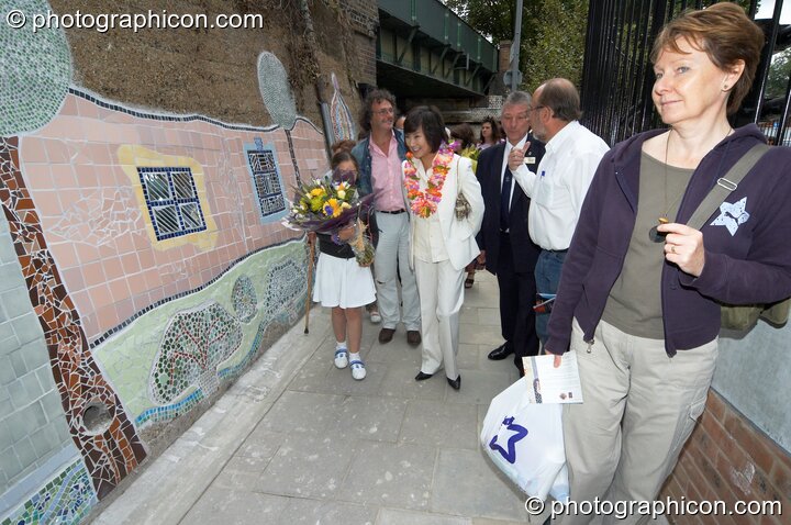 People admire Save The World Club's Hundertwasser mosaic. Kingston Upon Thames, Great Britain. © 2005 Photographicon