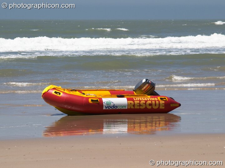 A brightly coloured rescue boat on the beach at Port St.Johns - Eastern Cape, South Africa. © 2005 Photographicon