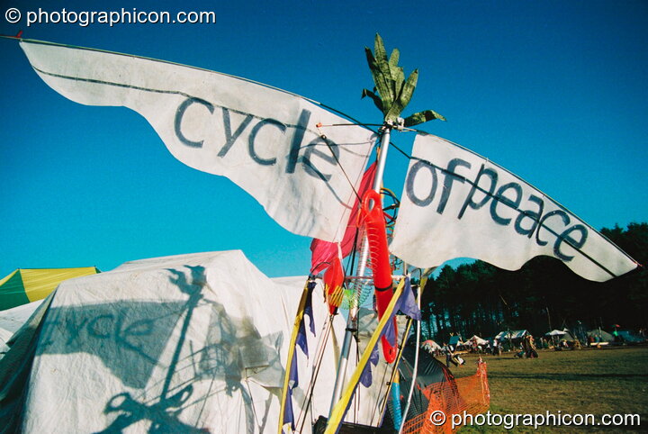 Wings with a message, attached to the top of Professor Des Kay's bicycle at Big Green Gathering 2003. Cheddar, Great Britain. © 2003 Photographicon