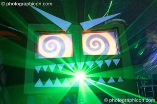 Monstrosity Labs' Garry Greenmonster (interactive stage art featuring LCD animated eyes and laser mouth) in the Monstrosity/Storm tent at Waveform Project 2007. Kenton, Exeter, Great Britain. © 2007 Photographicon