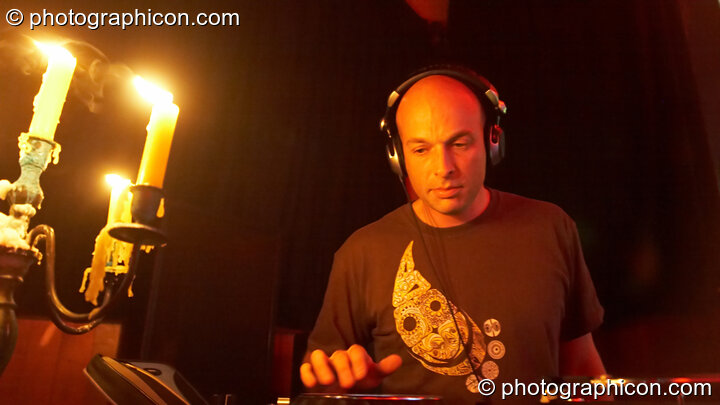 Dick Trevor DJs by candle light while Fluorotrash perform on the Skandalous! stage at Electric Circus / Circus2Gaza. London, Great Britain. © 2009 Photographicon