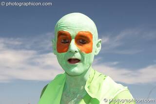 A man on a walkabout dressed as amphibian at Sunrise Celebration 2007. Yeovil, Great Britain. © 2007 Photographicon