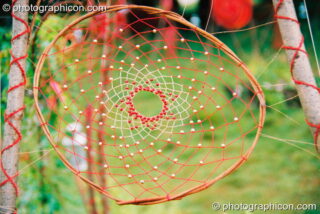 A dream catcher at Big Green Gathering 2003. Cheddar, United Kingdom. © 2003 Photographicon
