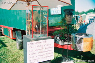 An exhibition of the fly found under John Lennon's floorboards, at Big Green Gathering 2003. Cheddar, United Kingdom. © 2003 Photographicon