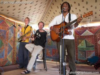 A bend perform at Big Green Gathering 2005. Burrington, Cheddar, United Kingdom. © 2005 Photographicon