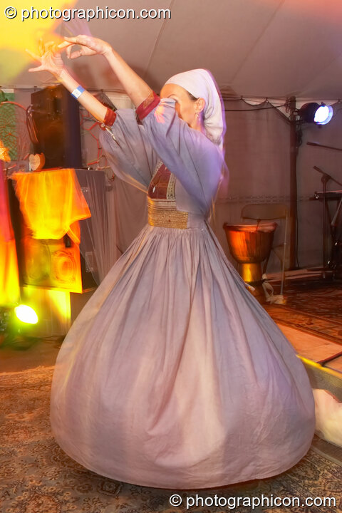 Sandra Eveno performs a traditional dance to Orchid Star in the Toad tent at Big Green Gathering 2006. Burrington, Cheddar, United Kingdom. © 2006 Photographicon