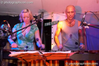 Becky Dell and Pete Ardron of Orchid Star playing on the Toad stage at Big Green Gathering 2006. Burrington, Cheddar, United Kingdom. © 2006 Photographicon