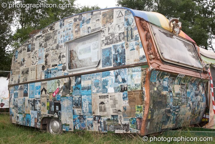 A caravan decorated with the covers of Festival Eye magazine at Big Green Gathering 2007. Burrington, Cheddar, United Kingdom. © 2007 Photographicon