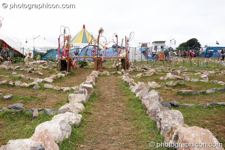 A stone labyrinth laid out on the grass at Big Green Gathering 2007. Burrington, Cheddar, United Kingdom. © 2007 Photographicon