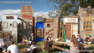 The wooden frontages of false buildings outside the Last Chance Saloon at Big Green Gathering 2007. Burrington, Cheddar, United Kingdom. © 2007 Photographicon