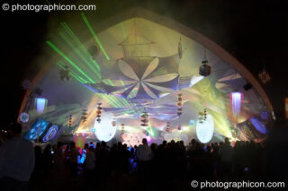 An external front view of lasers, lights, and decor in the Liquid Stage tent during a night time peformance at Glade Festival 2005. Aldermaston, United Kingdom. © 2005 Photographicon