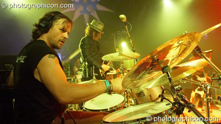 A close side profile of dum kit and drummer performing with Juno Reactor on the Glade Stage at Glade Festival 2006. Aldermaston, United Kingdom. © 2006 Photographicon