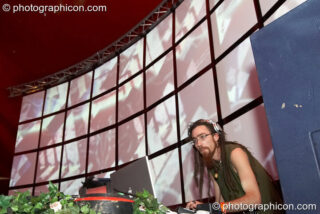 Slackbaba (Jonathan Smith - Liquid Records) performs with a visual installation backdrop by The Pixel Addicts on the Liquid Stage at Glade Festival 2007. Aldermaston, United Kingdom. © 2007 Photographicon