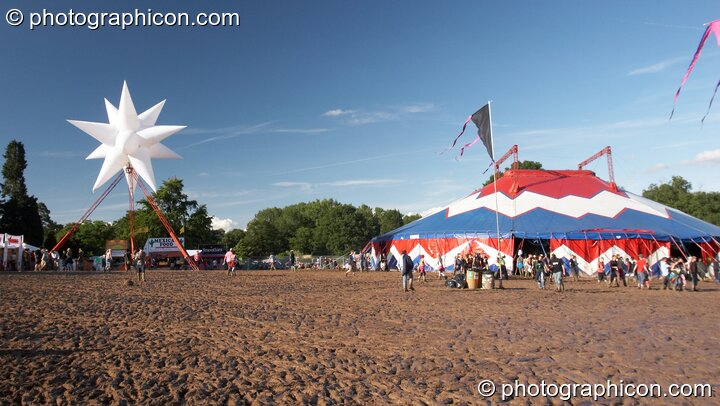 The mud-churned expanse of ground outside the Breaksday Stage at Glade Festival 2007. Aldermaston, United Kingdom. © 2007 Photographicon