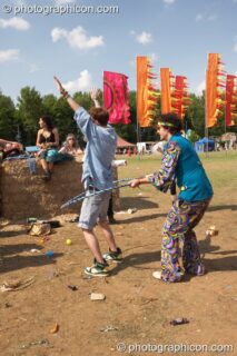 Wonky people play hoops by the Dance Off Stage at Glade Festival 2011. King's Lynn, United Kingdom. © 2011 Photographicon