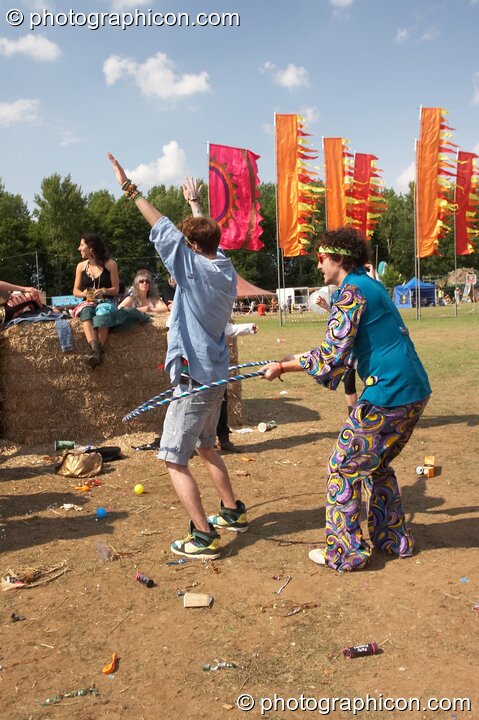 Wonky people play hoops by the Dance Off Stage at Glade Festival 2011. King's Lynn, United Kingdom. © 2011 Photographicon