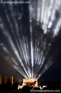 Light beams fan the sky from the Dance Off Stage at Glade Festival 2011. King's Lynn, United Kingdom. © 2011 Photographicon