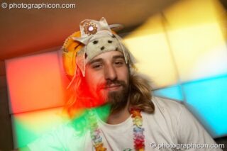 A wonky man dances in the Boom Bus at Glade Festival 2011. King's Lynn, United Kingdom. © 2011 Photographicon