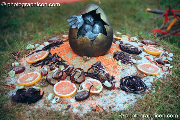 The egg shrine of a giant pheonix sculpture at Glastonbury Festival 2002. Pilton, United Kingdom. © 2002 Photographicon