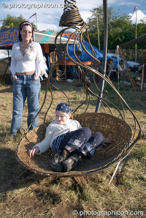 Suspended seat sculptures at Glastonbury Festival 2004. Pilton, United Kingdom. © 2004 Photographicon