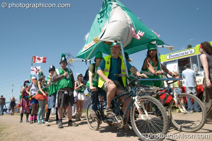 The Green Police pose with their Clean Green Support Machine at Glastonbury Festival 2004. Pilton, United Kingdom. © 2004 Photographicon