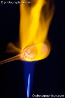 Hand-blown glassware being made by the wizard Ed Iglehart at Glastonbury Festival 2004. Pilton, United Kingdom. © 2004 Photographicon