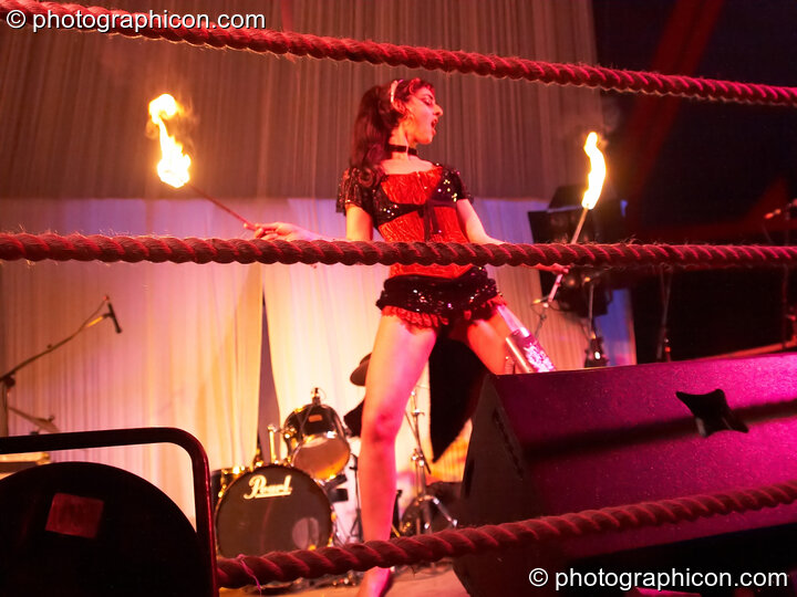 Miss Demeanor performs with fire in the Lost Vagueness Chapel at Glastonbury Festival 2007. Pilton, United Kingdom. © 2007 Photographicon