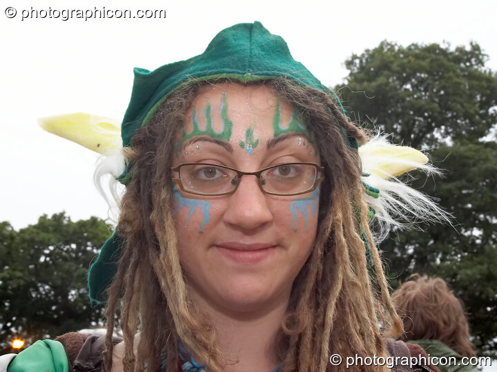 Portrait of Green Police officer Aylin Iylishco on patrol, with face painting by Simone & Natalie Kay, at Glastonbury Festival 2007. Pilton, United Kingdom. © 2007 Photographicon