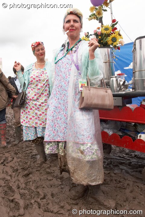 Two ladies sell tea from a trolley at Glastonbury Festival 2007. Pilton, United Kingdom. © 2007 Photographicon