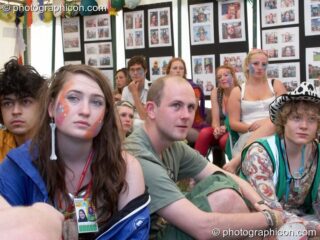 Portrait of a Green Police officer as they prepare their costume, with face painting by Simone Kay & her team, at Glastonbury Festival 2008. Pilton, United Kingdom. © 2008 Photographicon
