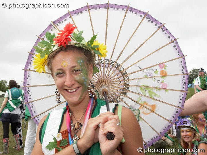 Portrait of a Green Police officer as they prepare their costume, with face painting by Simone Kay & her team, at Glastonbury Festival 2008. Pilton, United Kingdom. © 2008 Photographicon