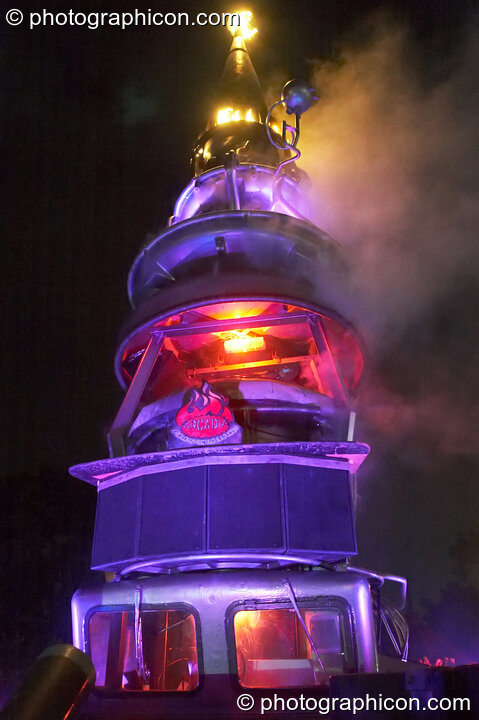 Fire and smoke leap from the central structure of the Mutoid Waste's Arcadia Installation in Trash City at Glastonbury Festival 2008. Pilton, United Kingdom. © 2008 Photographicon