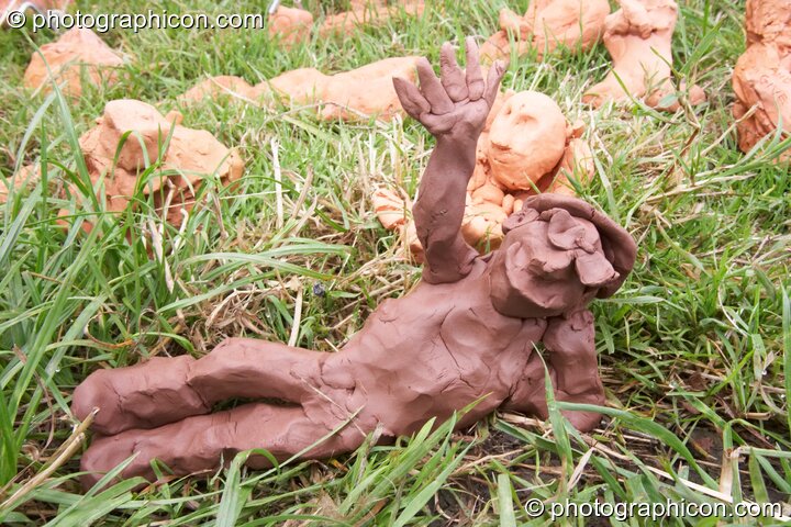 A large collection of clay self-portrait figures made by the passing public at Glastonbury Festival 2008. Pilton, United Kingdom. © 2008 Photographicon