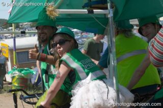 The Green Police pose with their Clean Green Support Machine at Glastonbury Festival 2004. Pilton, United Kingdom. © 2004 Photographicon