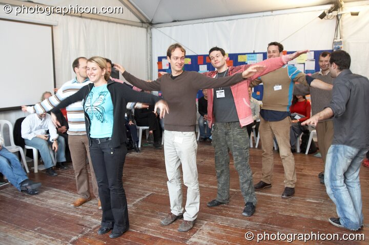 A physical demonstration of how flocks of geese maintain flight efficiency & group cohesion, at the Renaissance2 Great Shift Gathering 2009. Perpignan, France. © 2009 Photographicon
