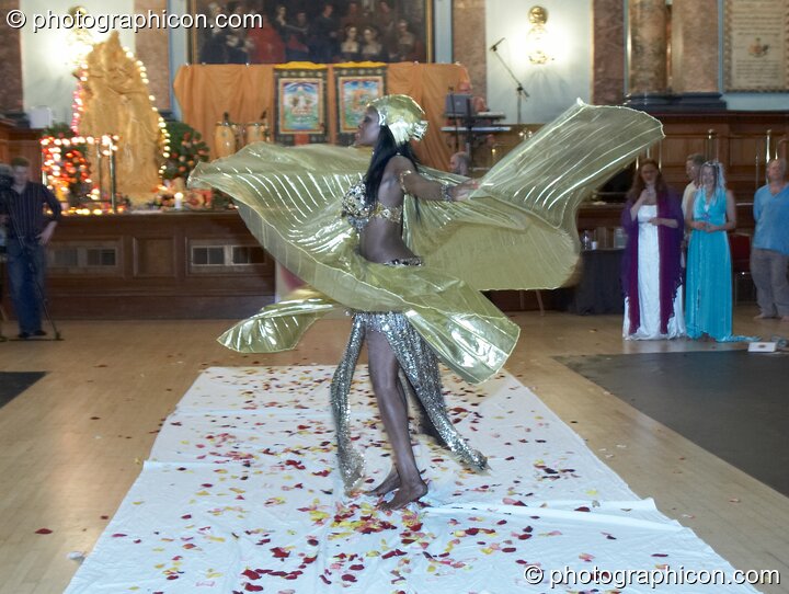 Solariss Abakari An-Ra perfoms an Egyptian Raqs Sharqui dance wearing a winged costume at the London Festival of Tantra 2008. London, United Kingdom. © 2008 Photographicon