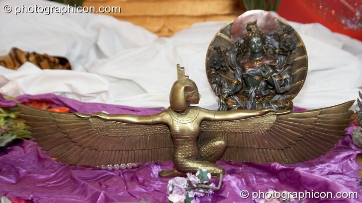 Small goddess statues on the stage at London Festival of Tantra 2009. London, United Kingdom. © 2009 Photographicon