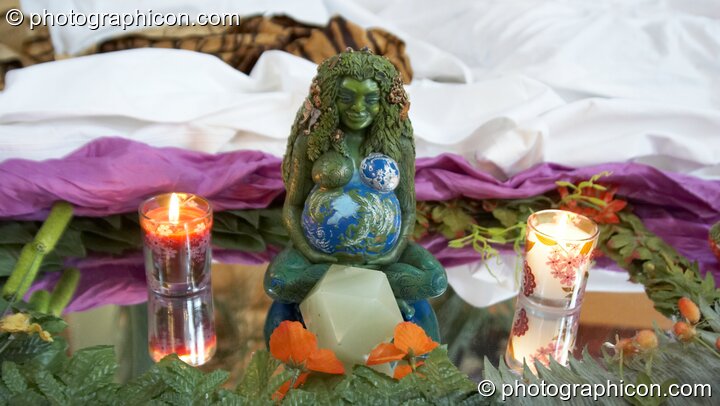 Small goddess statues on the stage at London Festival of Tantra 2009. London, United Kingdom. © 2009 Photographicon