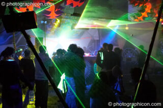 Lasers, decor, and dancers inside the Main Stage dome at Planet Bob's Offworld Festival 2007. Swindon, United Kingdom. © 2007 Photographicon