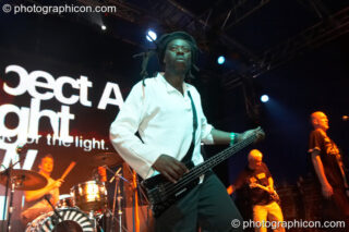 Greg Roberts, Leo Williams, Steve Roberts, and MC Spee of Dreadzone perform on the Main Stage with projections by Inside-Us-All at the Secret Garden Party 2006. Huntingdon, United Kingdom. © 2006 Photographicon