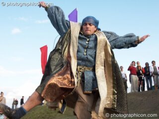 A man in costume takes a tumble during the  dangerous sports skating challenge at the Secret Garden Party 2006. Huntingdon, United Kingdom. © 2006 Photographicon
