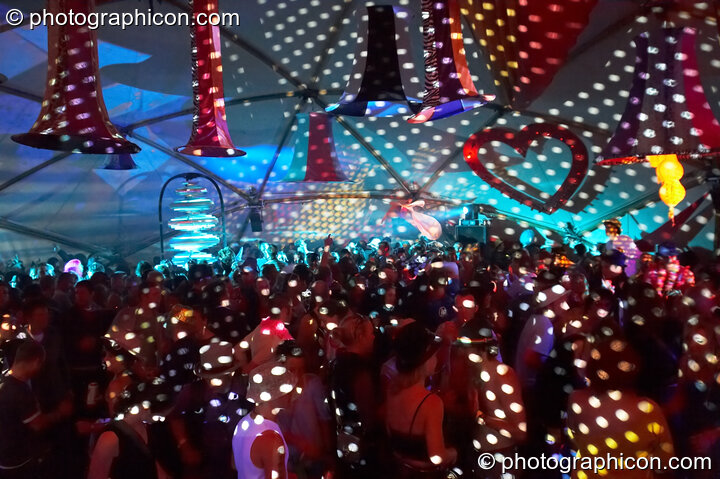Dancers, decor, and projections in the Fish Seeks Bicycle's Looniverse tent at the Secret Garden Party 2007. Huntingdon, United Kingdom. © 2007 Photographicon