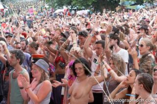 The crowded audience watch Morcheeba perform on the Great Stage at the Secret Garden Party 2008. Huntingdon, United Kingdom. © 2008 Photographicon