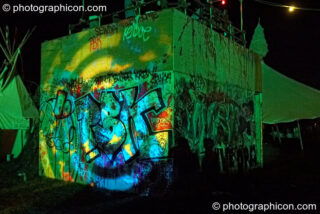 A wooden structure illuminated with patterned light at the Secret Garden Party 2008. Huntingdon, United Kingdom. © 2008 Photographicon