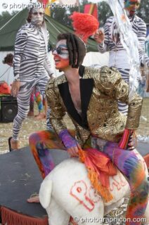 A street theatre troupe in wonky costume at the Secret Garden Party 2010. Huntingdon, United Kingdom. © 2010 Photographicon