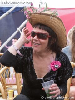 A woman in a wonky hat at the Secret Garden Party 2010. Huntingdon, United Kingdom. © 2010 Photographicon