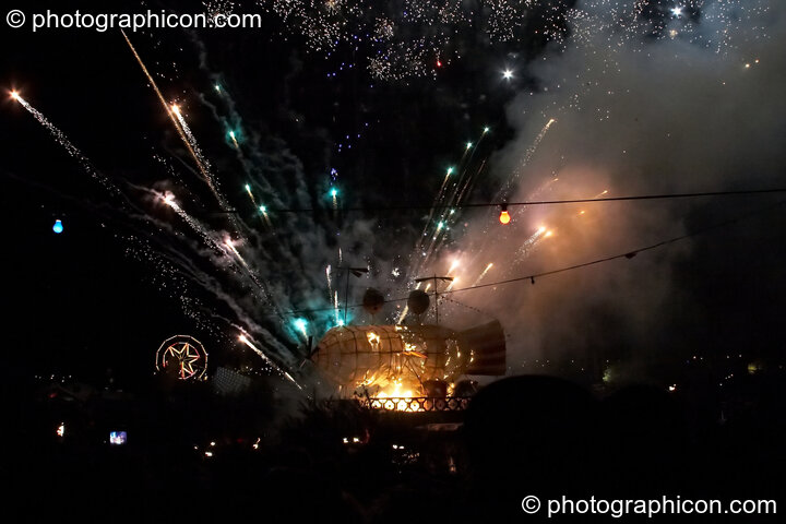 Fireworks erupt from the Blimp on the lake at the Secret Garden Party 2010. Huntingdon, United Kingdom. © 2010 Photographicon