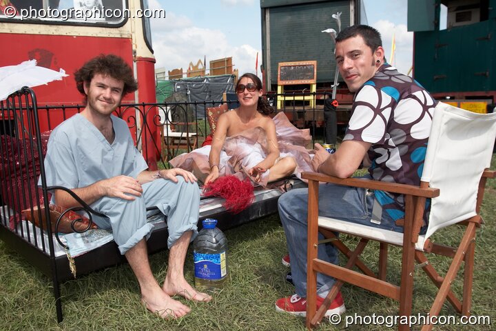 Friends relax in an outdoor bedroom at Sunrise Celebration 2007. Yeovil, United Kingdom. © 2007 Photographicon