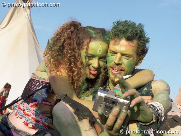 Green pixies, Lindsay and Glen, photograph themselves at Sunrise Celebration 2007. Yeovil, United Kingdom. © 2007 Photographicon
