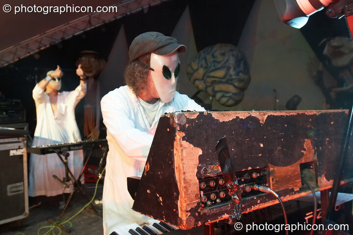 Merv Pepler and Joie Hinton of Eat Static perform in space alien masks on the Sunrise Stage at Sunrise Celebration 2007. Yeovil, United Kingdom. © 2007 Photographicon